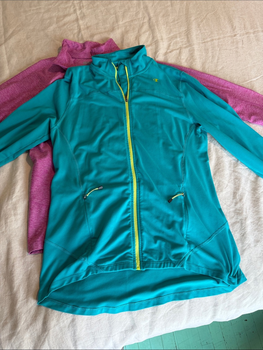 2 zip jackets. Pink= Gander Mountain heather pink. Turquoise = Champion